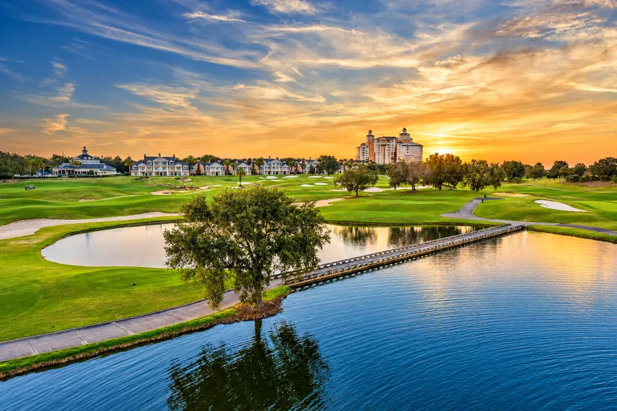 Sunset over the lake and golf course at Reunion Resort