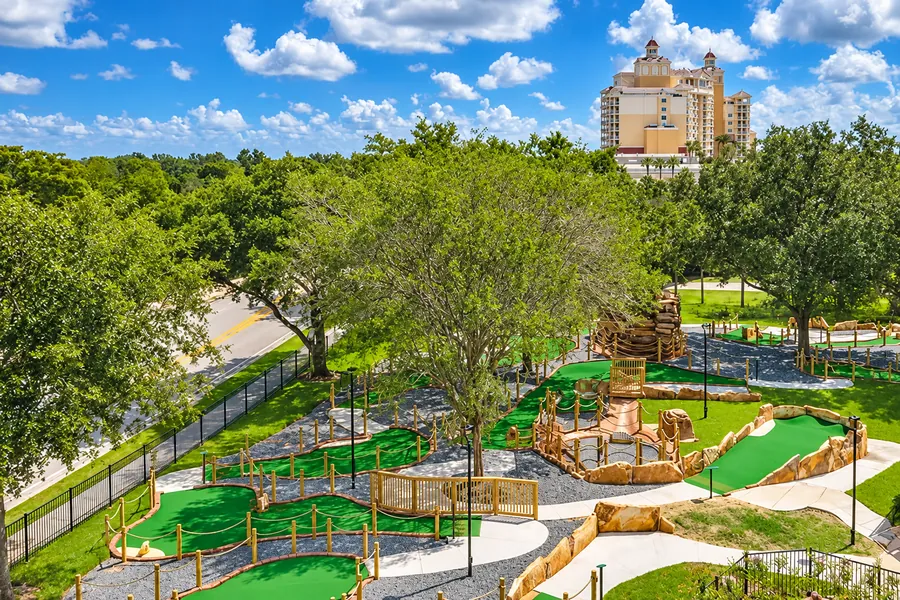 Reunion Resort mini golf with the Grande hotel beyond